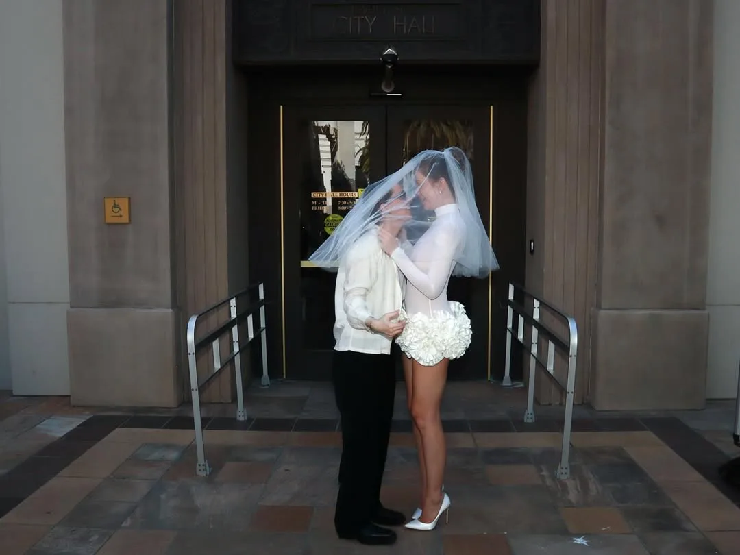 gabby windey wedding with robby hoffman outside courthouse